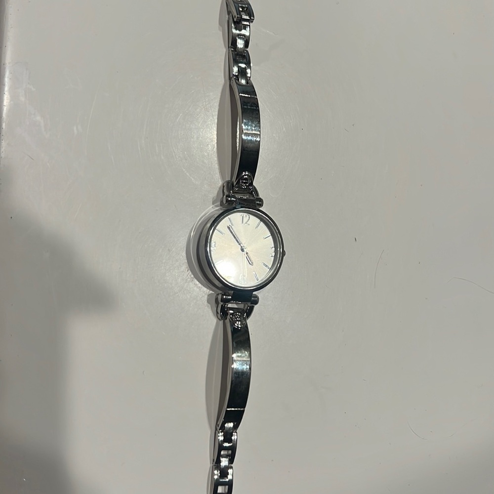 Stainless steel metal bezel watch